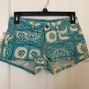 Roxy low waisted teal and white shorts